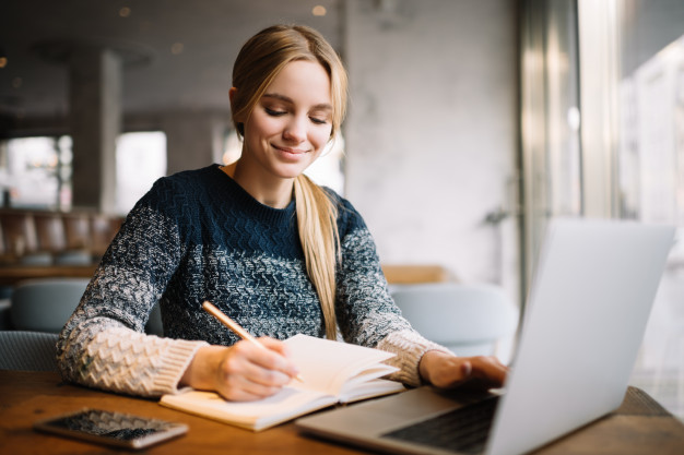 student-studying-using-laptop-computer-online-education-beautiful-woman-freelancer-writes-notes-planning-working-project-working-from-home_207258-299.jpg